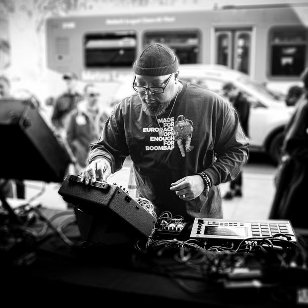 Corry Banks playing a Modbap rack and MPC at an outdoor event